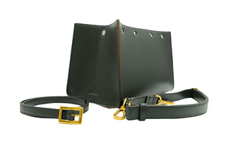 Desert green interchangeable accessories for Lavada vegan leather handbag, includes outer cover, strap, and belt. Shown against white background.