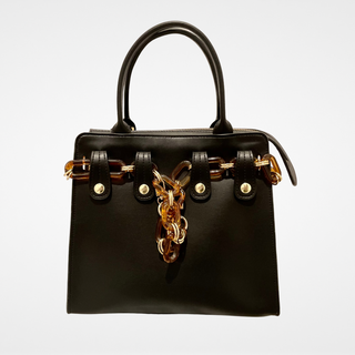 Black handbag with removable resin and gold chain detail. Made from cactus vegan leather