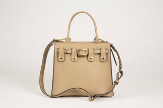 Image of Lavāda's signature vegan leather 4-in-1 interchangeable handbag in tan. Choose your exterior color. All included