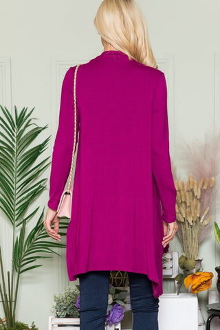 rear view of magenta cardigan made from rayon, large pockets