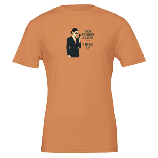 funny eco friendly burnt orange tshirt with graphic of woman holding cell phone. Caption is 'fast fashion called, I hung up' Eco friendly, 100% cotton