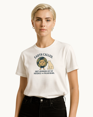 Female model wearing white eco friendly, graphic tshirt that reads 'Earth Called. She's Running Out of Patience and Polar Bears'