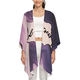 Women's kimono in dramatic purple and soft pink swirls with the word "love" printed on the front. Recycled and eco friendly cover up