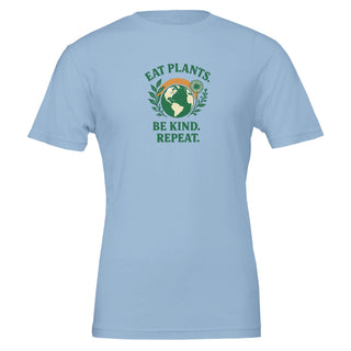 Light blue graphic tshirt that reads "Eat plants, be kind, repeat." 100% cotton. Eco friendly