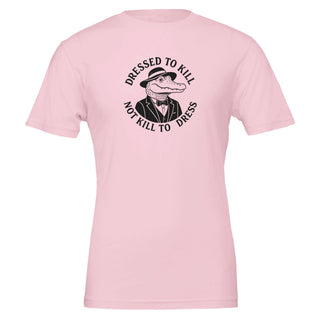 pink t-shirt with a graphic of an alligator in a suit and text saying 'dressed to kill, not kill to dress' 100% cotton, conscious fashion