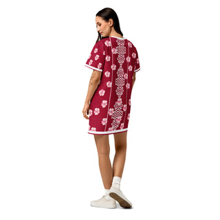 Rear view of woman wearing red and white geometric graphic cotton tshirt with pink floral details, 95% cotton