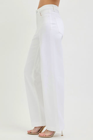 Side view of white jean pants with front and back pockets
