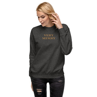 model wearing gold embroidered Very Merry sweatshirt in charcoal heather